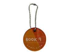 Load image into Gallery viewer, Book 9 Brag Tag
